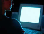 Picture of child at computer screen